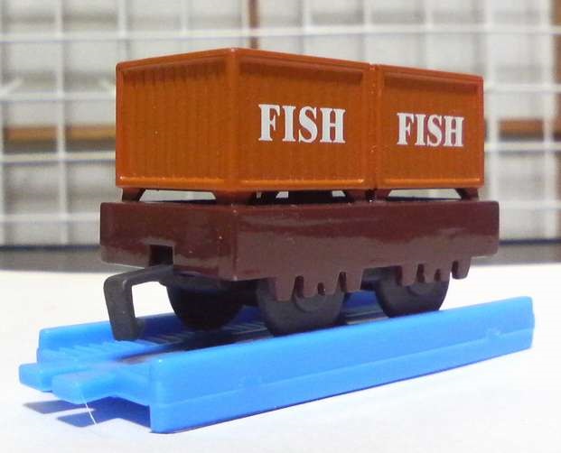 橙茶色の魚のコンテナ車