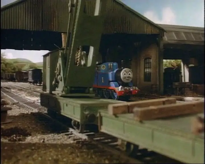 トーマスとクレーン車と共にいる灰色のイギリス国鉄の20トンブレーキ車