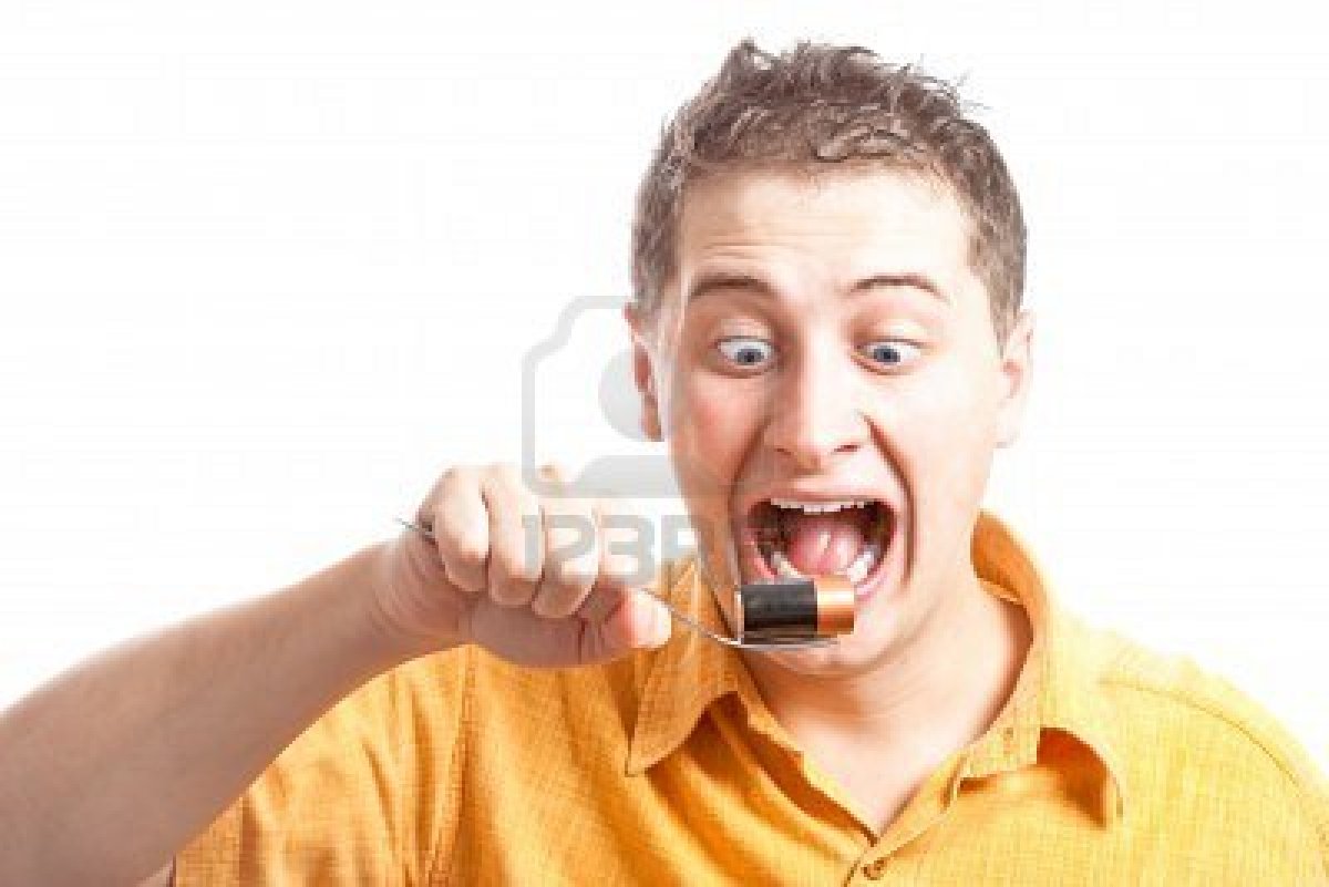 /3942186-mad-man-eating-battery-with-mwtal-fork.jpg